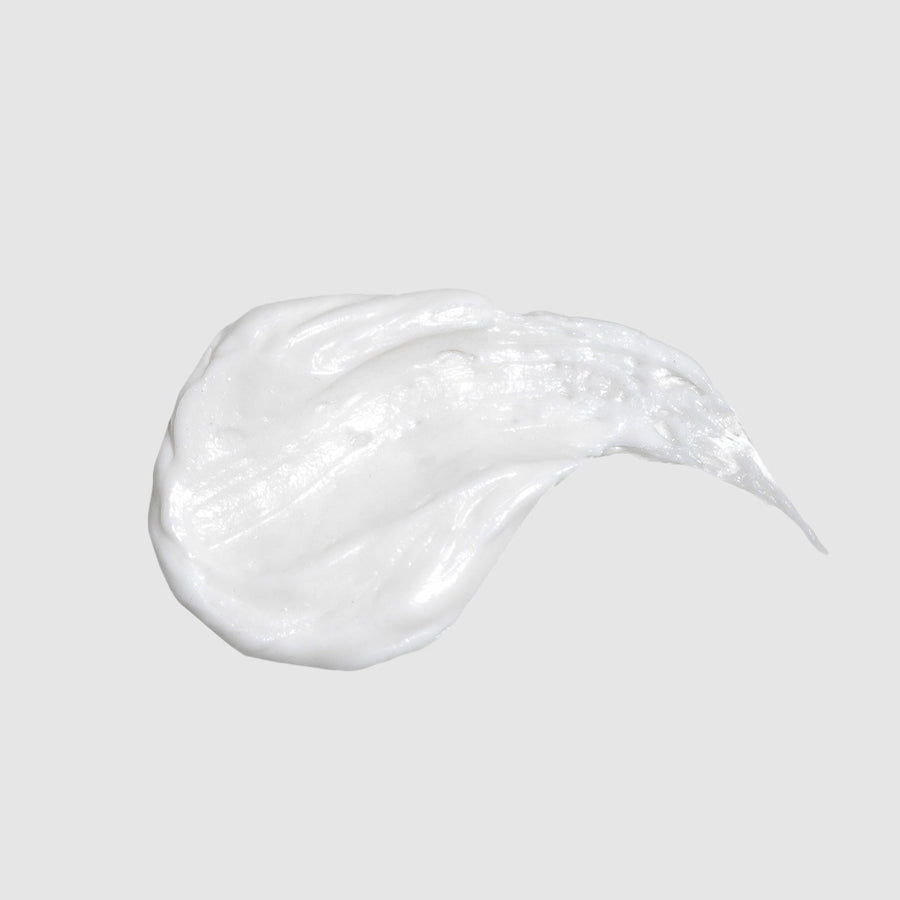Smear of unscented body butter showing rich, creamy texture